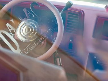 The interior of Mercedes Mata’s “La Mera Mera,” a 1984 Monte Carlo, is decked out in pink...