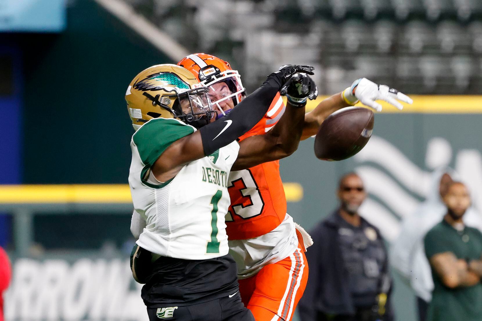 Rockwall defender Cadien Robinson (13) defends a pass intended for DeSoto receiver Johnny...