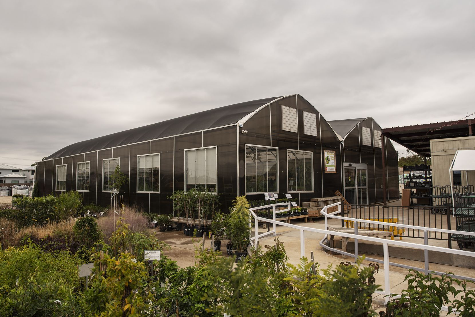 The new greenhouses at the North Haven Gardens in Dallas are among the new buildings on the...