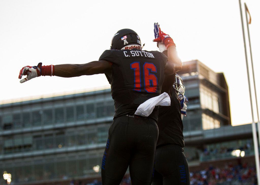 Southern Methodist Mustangs wide receiver Courtland Sutton (16) celebrates with running back...