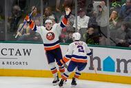 New York Islanders center Bo Horvat (14) celebrates after his overtime winning goal with...
