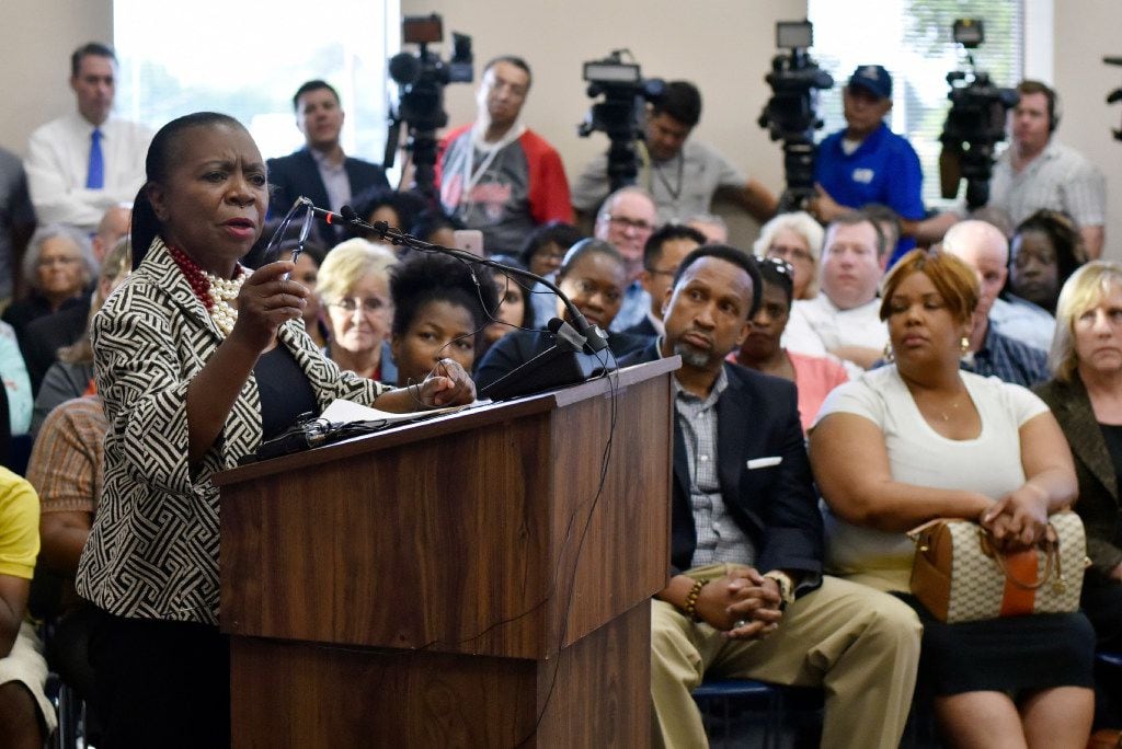 Anna Williams addresses the DeSoto school board before a standing-room only crowd Monday....