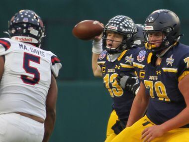 Highland Park quarterback Brayden Schager (13) looks to pass behind the protection of...