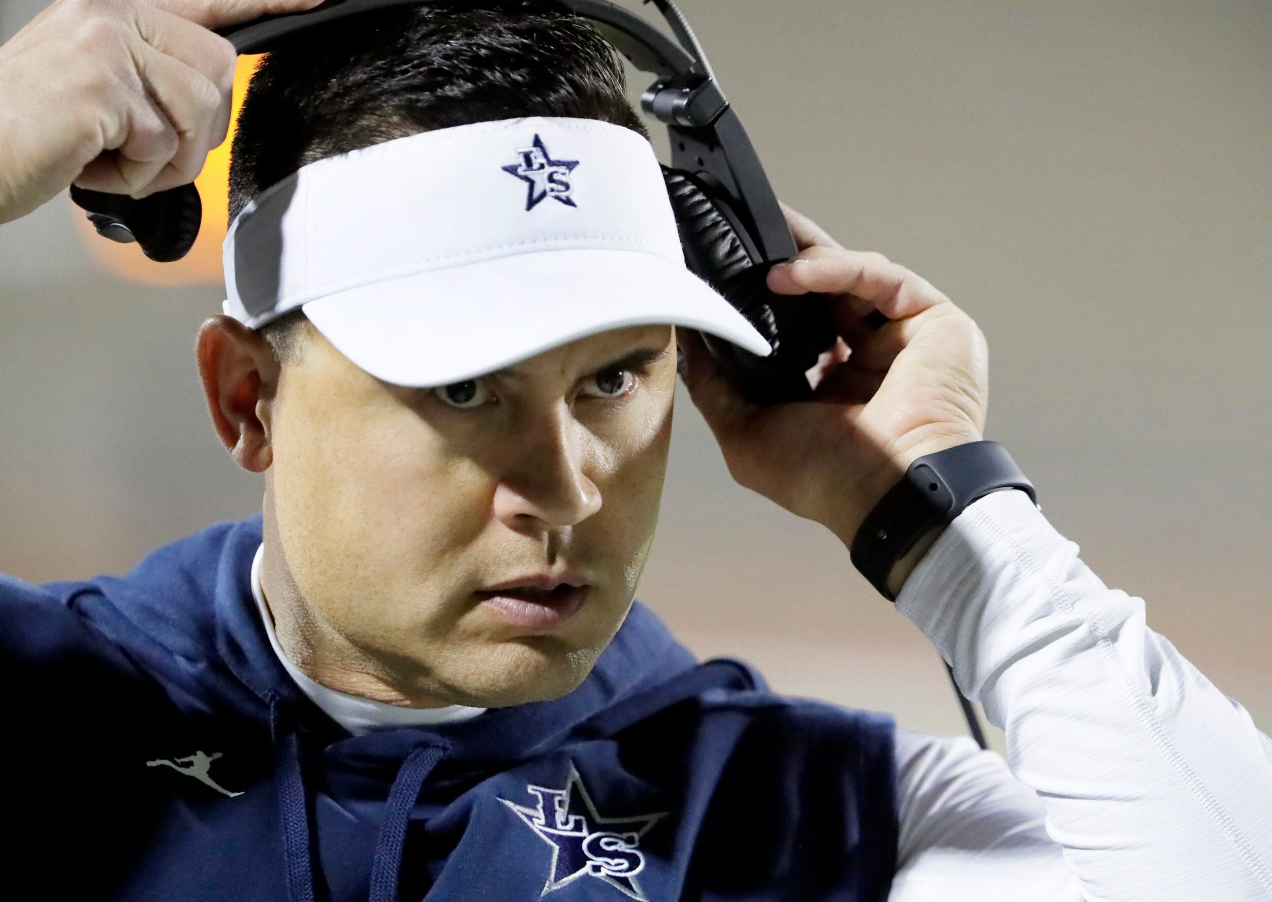 Lone Star High School head coach Jeff Rayburn was upset with a spot during the first half as...