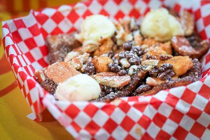 The State Fair of Texas' new Bourbon Banana Caramel Sopapillas are huge. Share with a friend.