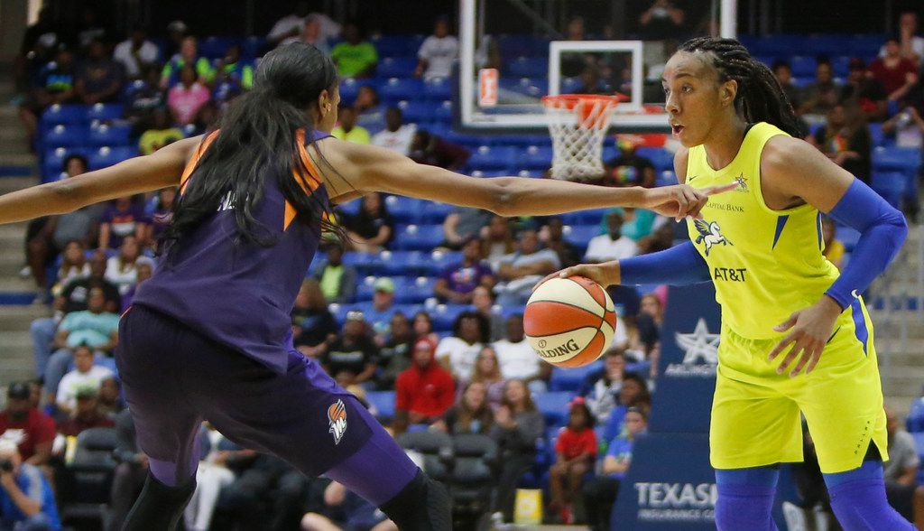 Dallas Wings forward Kayla Thompson (6) dribbles as she is defended by Phoenix Mercury forward DeWanna Bonner (24) during 4th quarter action. The Wings defeated the Mercury, 69-54. The two teams played their WNBA game at UT-Arlington's College Park Center in Arlington on June, 20, 2019.  (Steve Hamm/ Special Contributor)