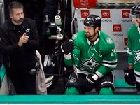 Dallas Stars left wing Jamie Benn (14) is recognized for his 1,000th game played during a...