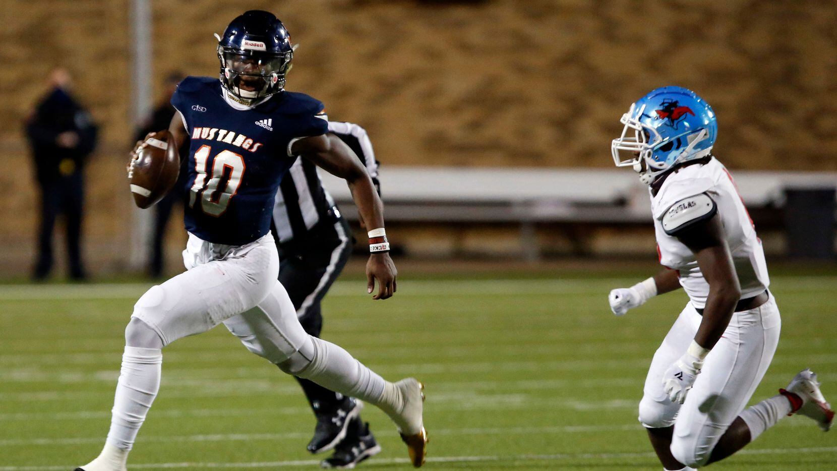 Sachse QB Alex Orji (10) scrambles from a Skyline defender during the first half of a high...
