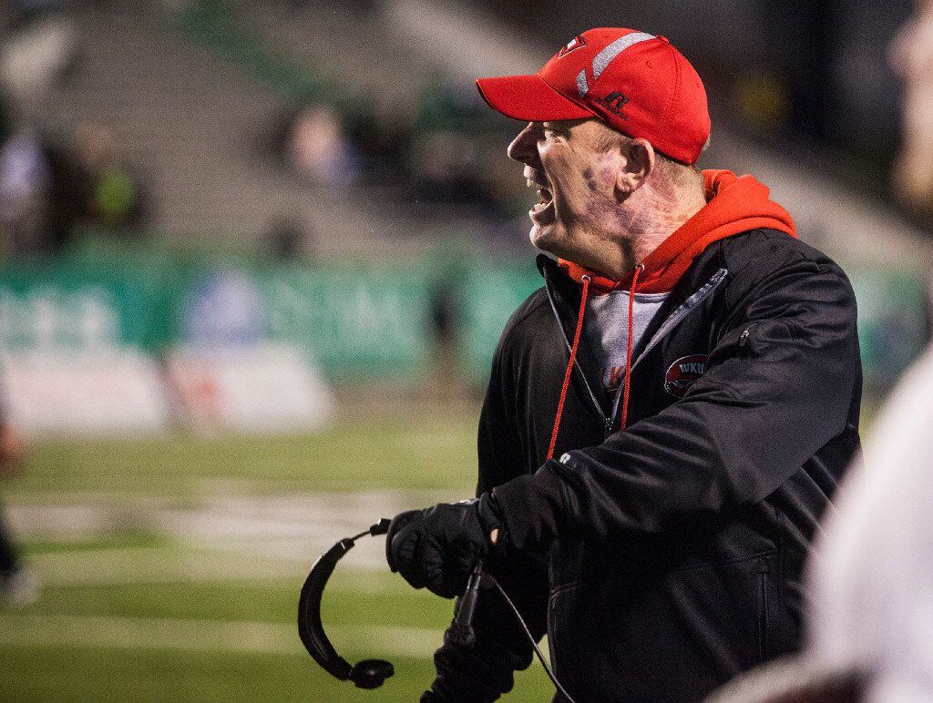 Western Kentucky coach Jeff Brohm shouts at a player during Western Kentucky's 60-6 win over...
