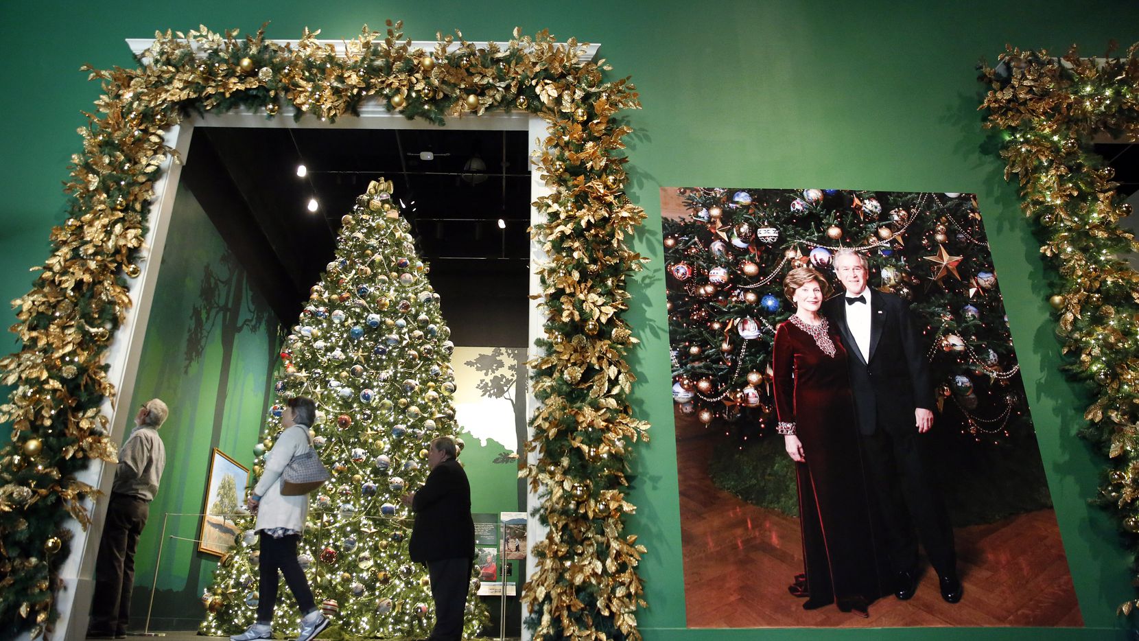 Visitors view an 18-foot replica of the official White House Blue Room Christmas tree from...