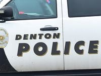 A Denton police vehicle is parked at a crime scene in this May 2015 file photo.