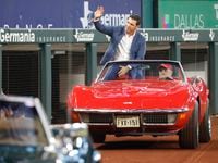 Former Texas Ranger Ian Kinsler waves as he arrives at the induction ceremony at Globe Life...