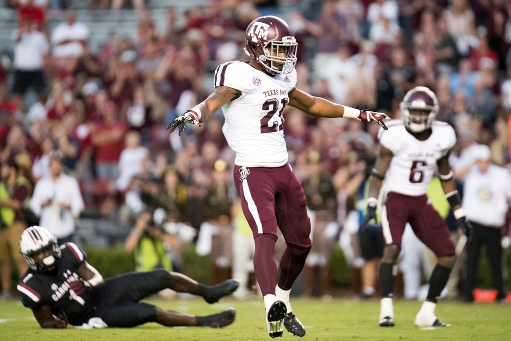 Texas A&M defensive back Charles Oliver (21) reacts after a play against South Carolina last...