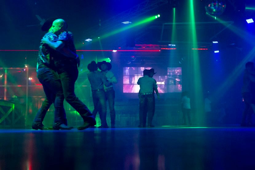 In mid-June, dancers take the floor at Club Los Rieles in Dallas.