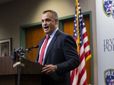 Matthew DeSarno, special agent in charge of the FBI Dallas Field Office, seen speaking at a news conference in August, said Friday that he disputed a statement by former Dallas police Chief U. Reneé Hall regarding the FBI's role in the decision to keep an officer on the job who was suspected in two murder cases.