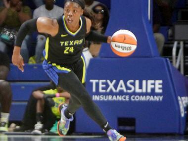 Dallas Wings guard Arike Ogunbowale (24) looks to set up an offensive play during first half...