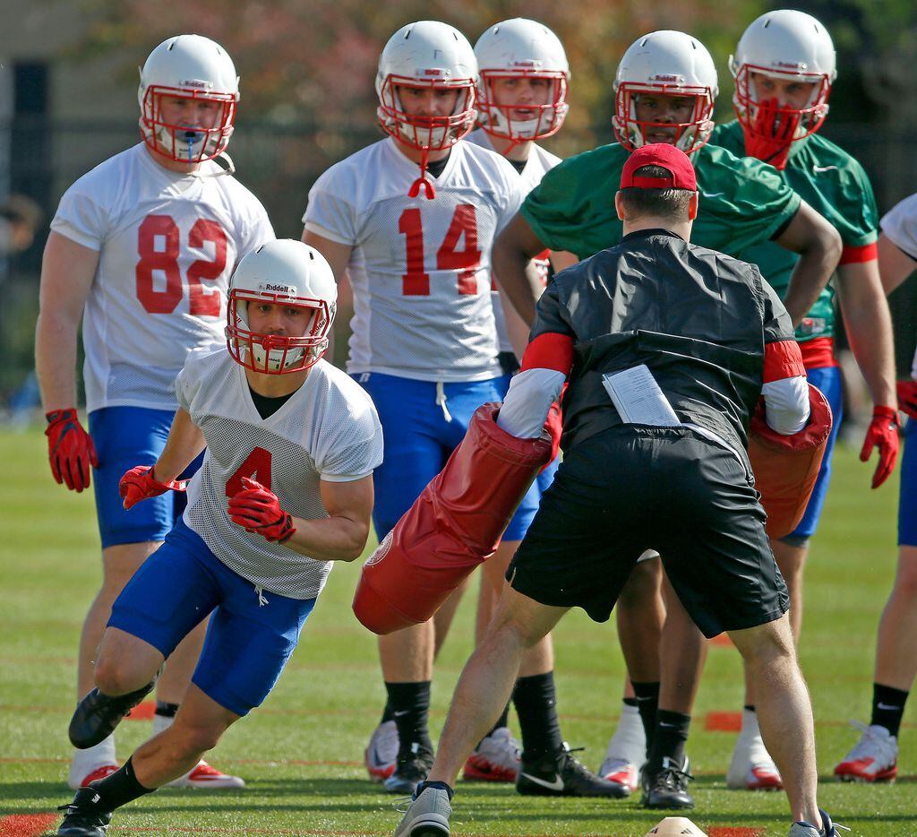 SMU wide receiver Tyler Page (4) goes through a drill during the first spring practice of...