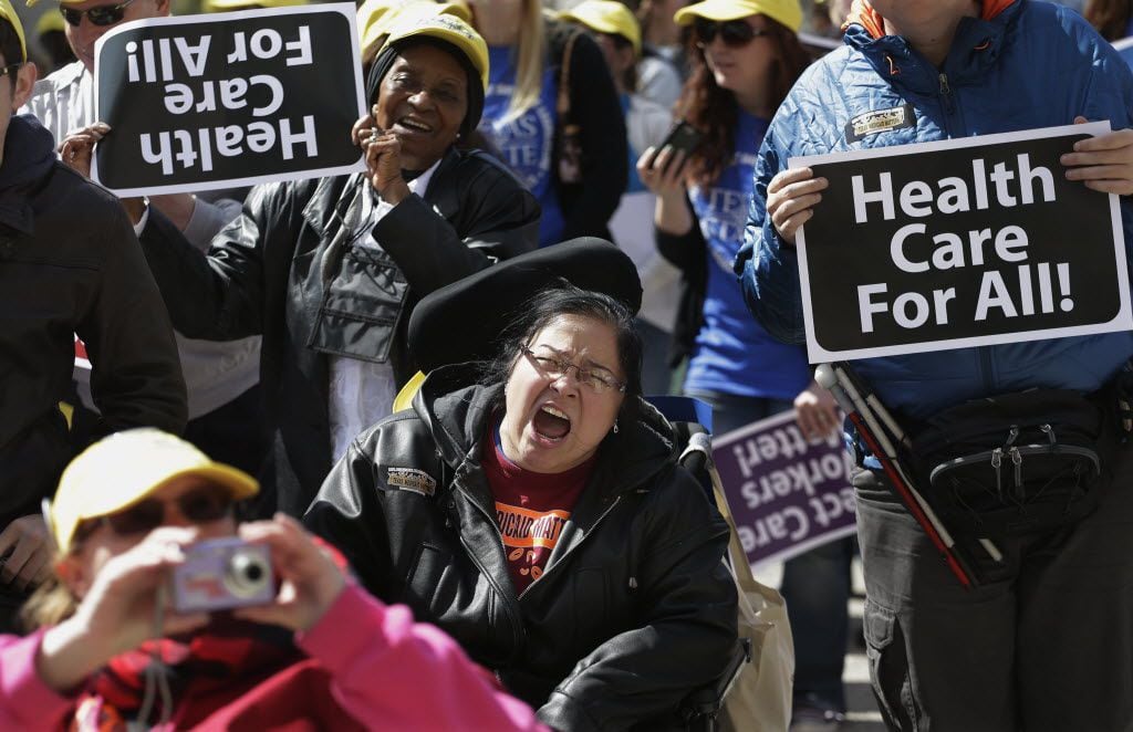 Protesters in Austin demanded expansion of Medicaid in 2013.