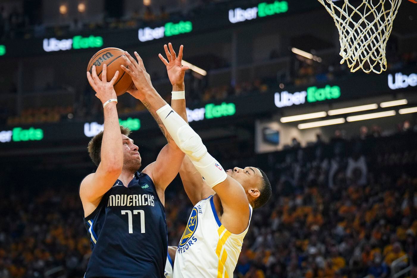 Dallas Mavericks guard Luka Doncic (77) drives to the basket against Golden State Warriors...