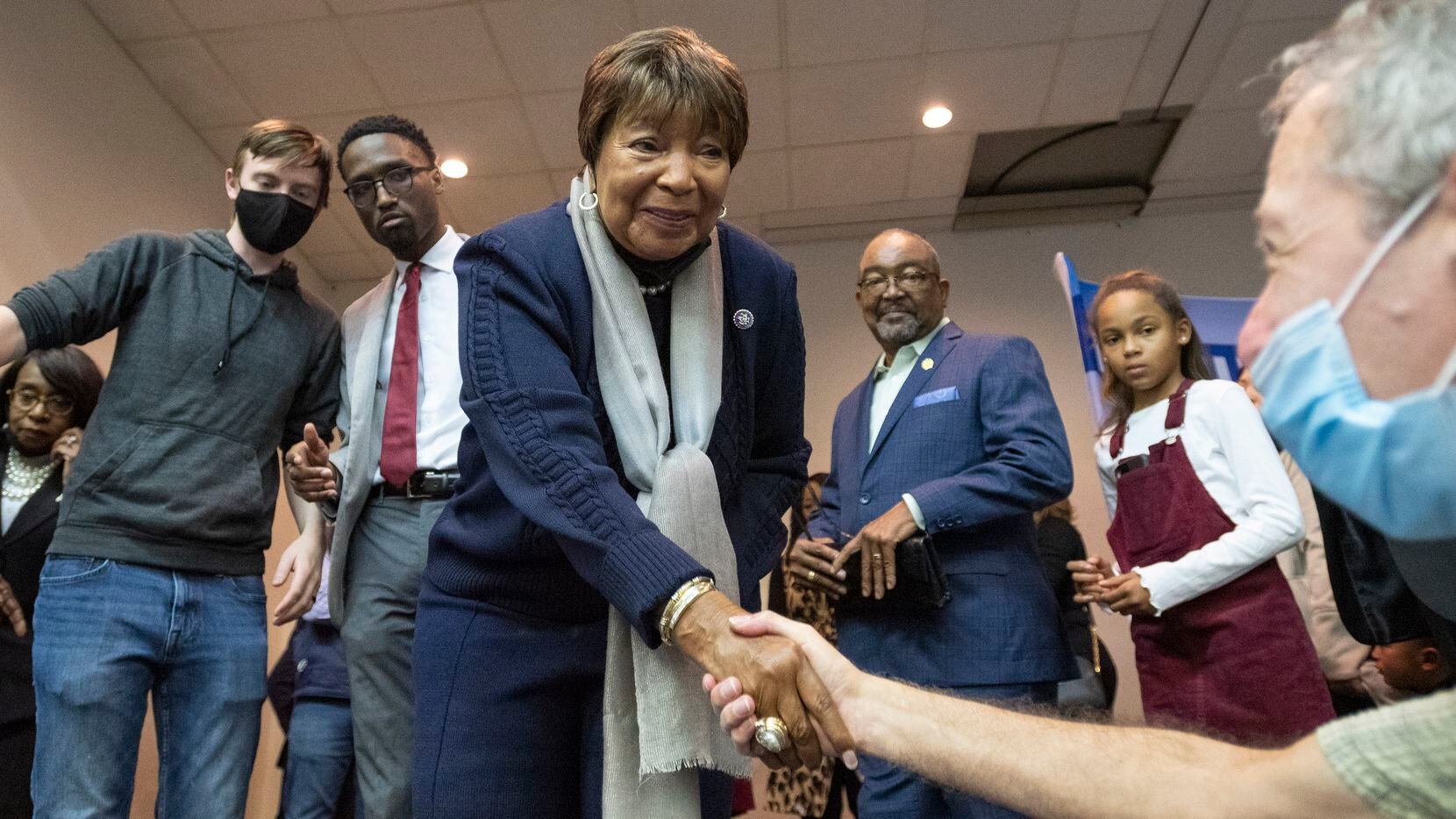 U.S. Rep. Eddie Bernice Johnson is congratulated by friends and colleagues after she...