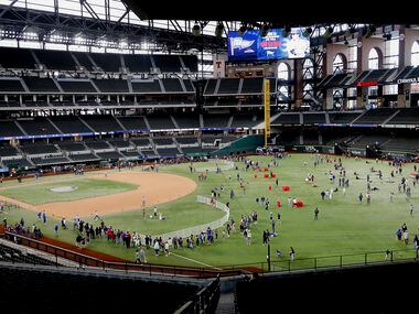 Texas Rangers fans turned out to experience the field as the Rangers Fan Fest was held at...