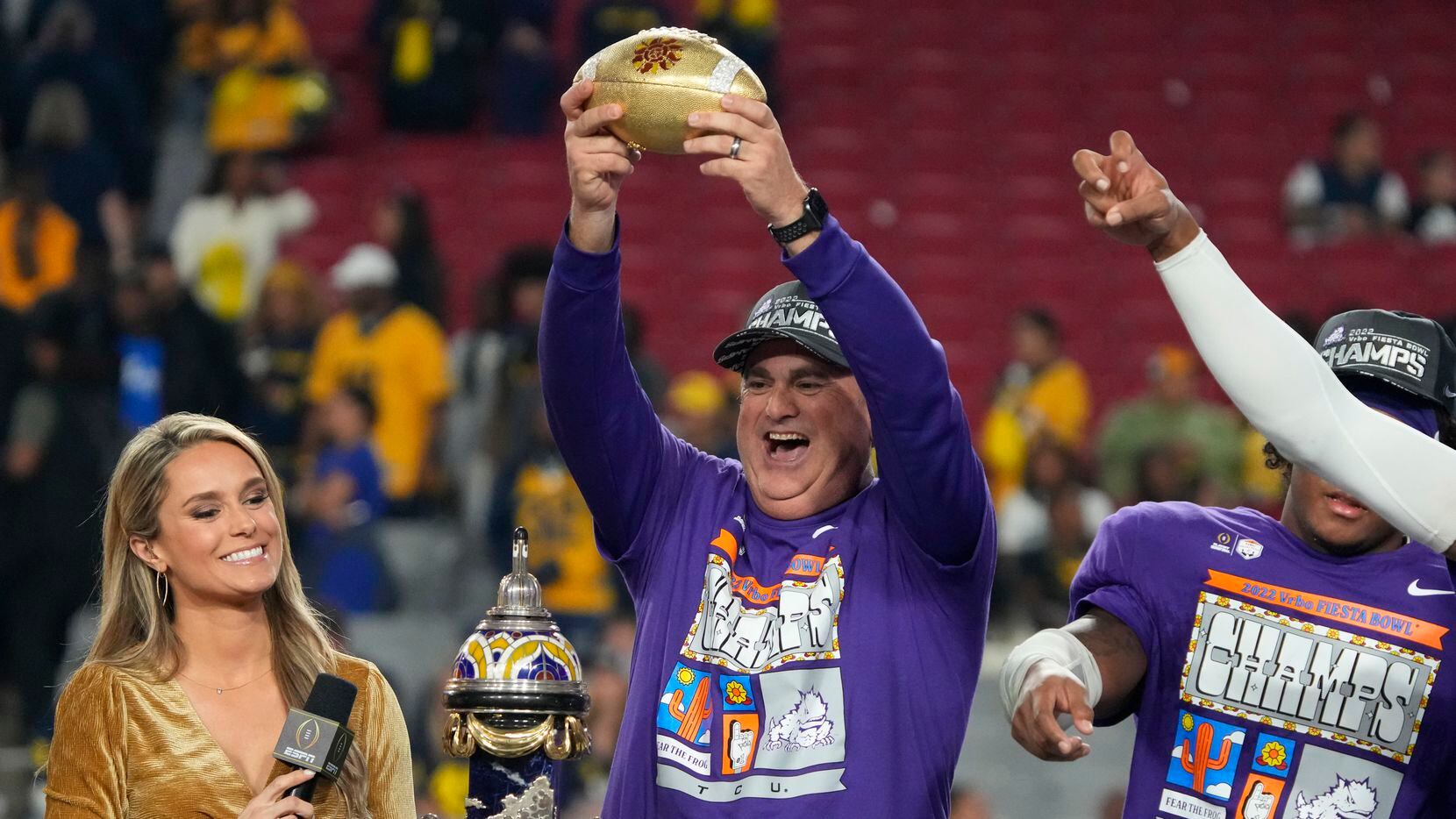 TCU head coach Sonny Dykes holds the trophy after the Fiesta Bowl NCAA college football...