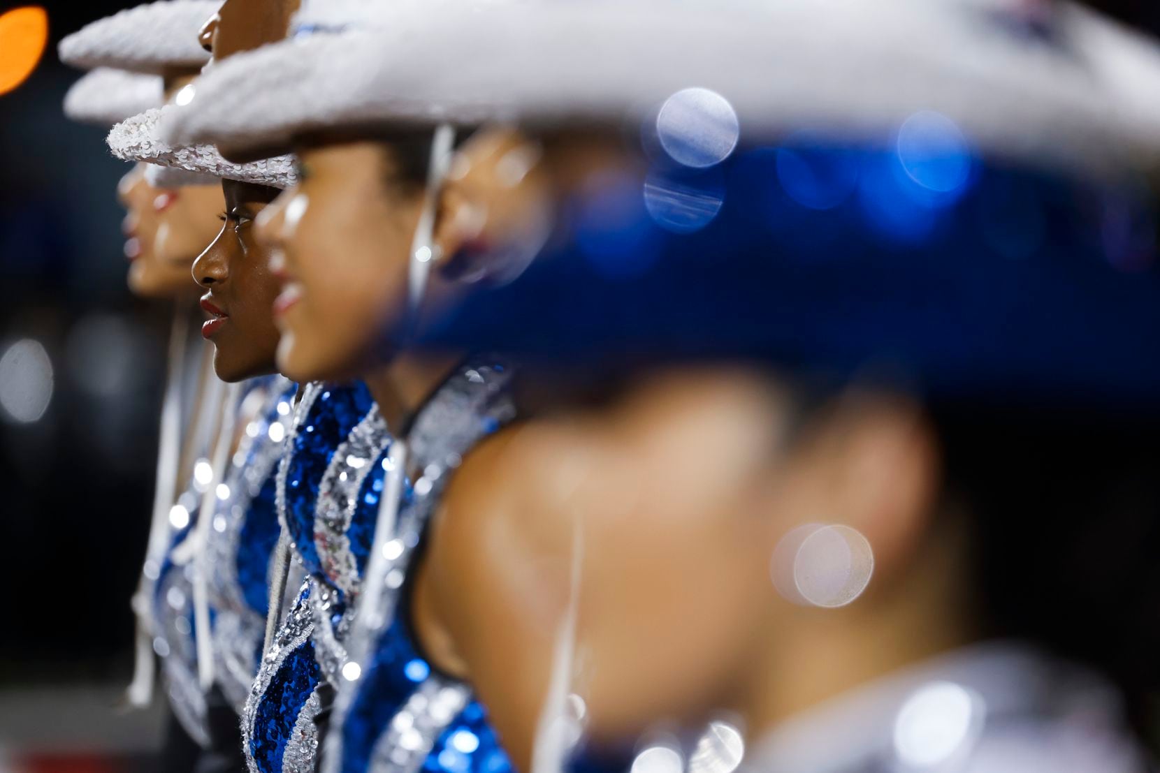 North Crowley High School’s Silver Stars team wait by the sideline during the half time of a...