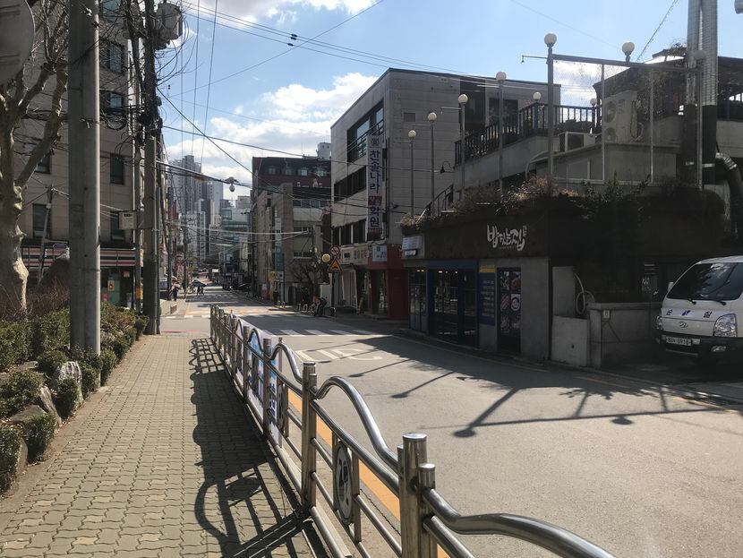 Streets in Seoul that are normally full of traffic and pedestrians are mostly empty now.