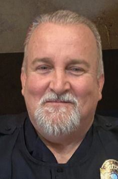 Retired Grand Prairie police officer Chris Bardwell died of complications due to COVID-19.