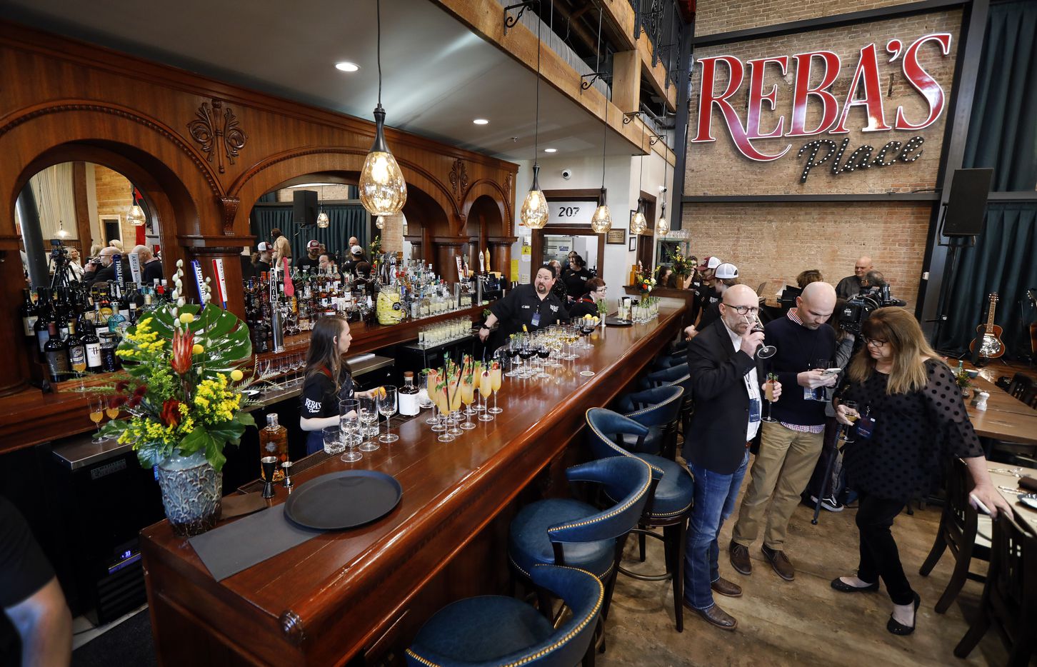 The main floor of Reba’s Place showcases a restored antique bar that is more than 100 years...