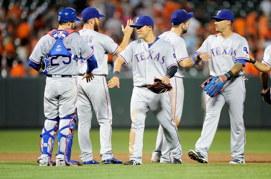 BALTIMORE, MD - AUGUST 04:  The Texas Rangers celebrate after a 5-3 victory against the...