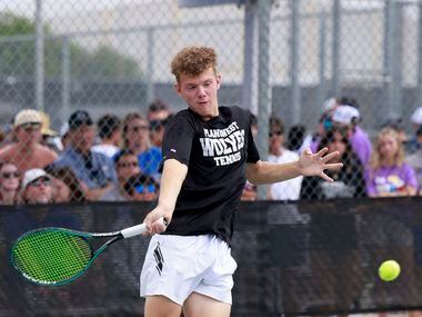 Plano West’s Dmitri Goubin jumps to hit a shot during the 6A mixed doubles championship...