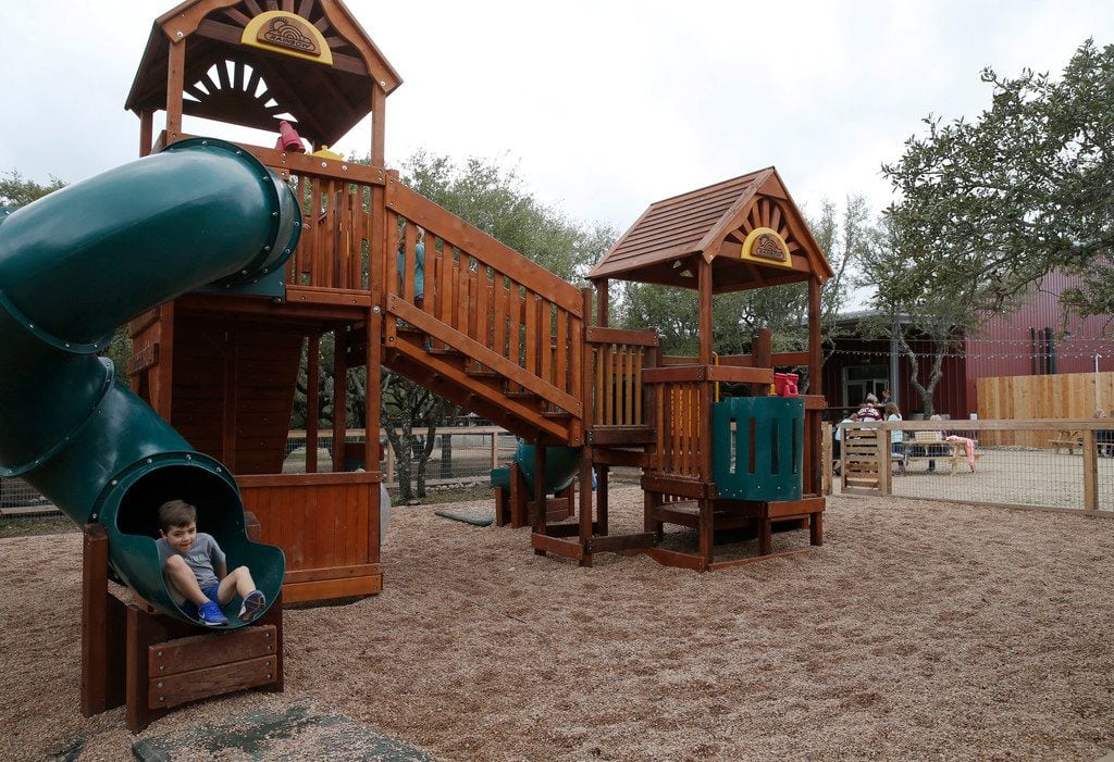 Noah Irwin, 6 of Austin plays in the playground that sits next to the taproom of Family...