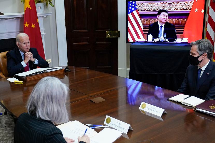President Joe Biden met virtually with Chinese President Xi Jinping from the Roosevelt Room...