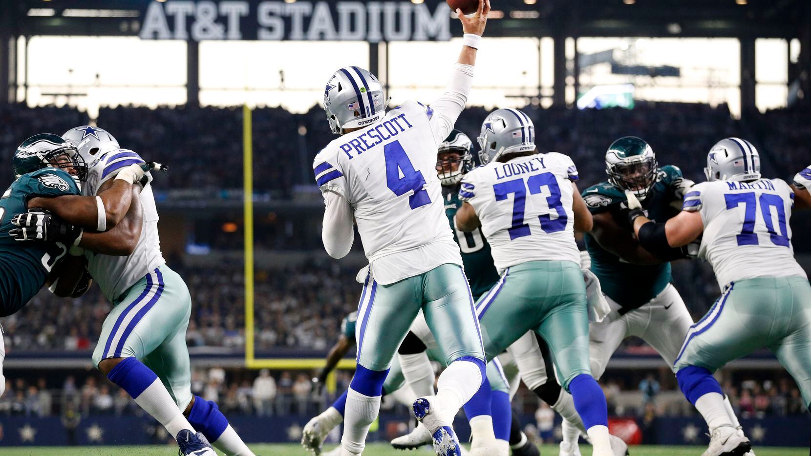 Dallas Cowboys quarterback Dak Prescott (4) throws a third quarter interception to...