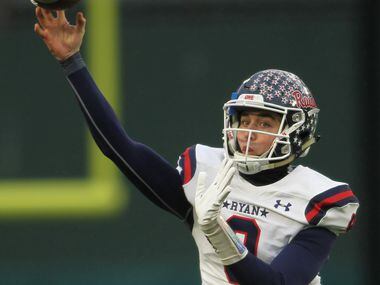 Denton Ryan quarterback Seth Henigan (9) launches a pass downfield during first half action...