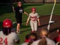 Flower Mound Marcus sophomore Avery Rich (12) runs home after hitting a solo home run during...