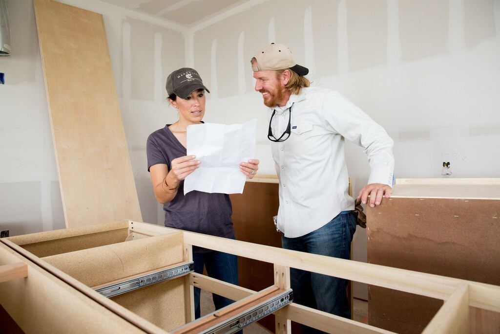 Chip and Joanna Gaines on the set of their HGTV show Fixer Upper: Behind the Design talk...