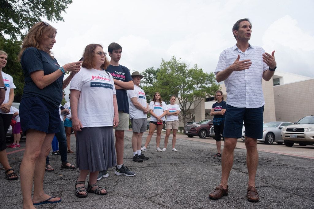 Nathan Johnson (right) talks with volunteers before they set out to canvass a neighborhood on Monday, Sept. 3, 2018.  He is running against Don Huffines for the Texas Senate in District 16. 