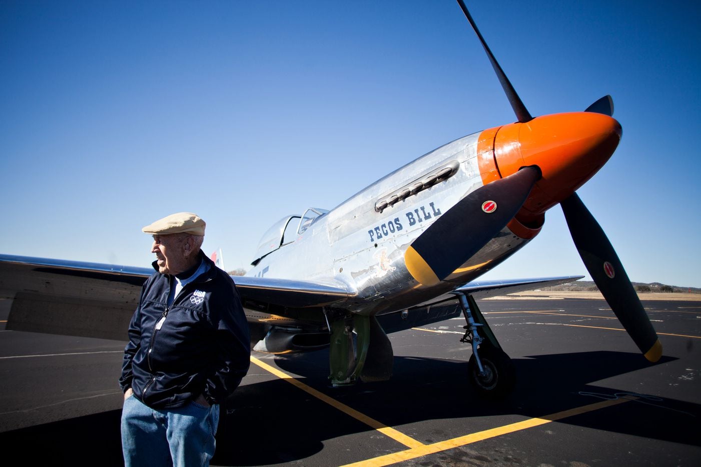 Richard "Dick" Cole stood by a vintage WWII plane at Gillespie Country Airport in...