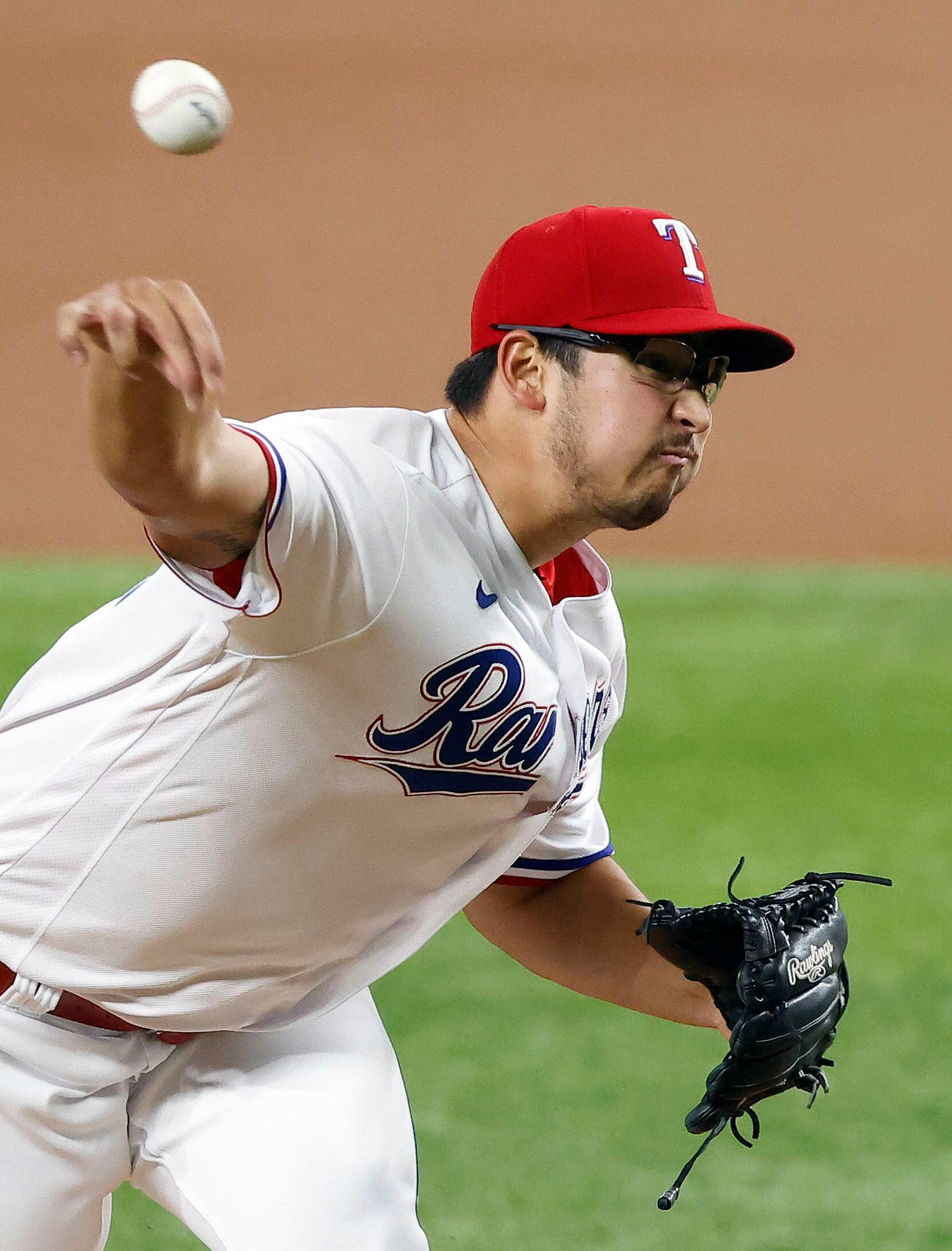 Texas Rangers starting pitcher Dane Dunning (33) throws against the Los Angeles Angels during the first inning at Globe Life Field in Arlington, Texas, Wednesday, April  28, 2021. (Tom Fox/The Dallas Morning News)