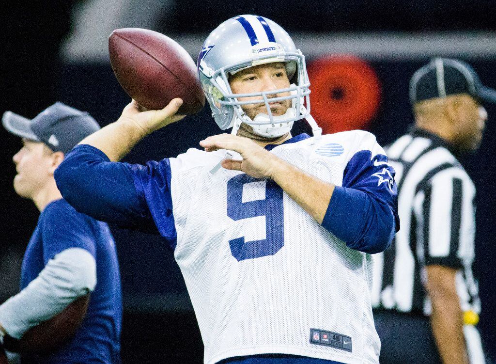 Dallas Cowboys quarterback Tony Romo (9) throws a pass during practice on Friday, January 6,...