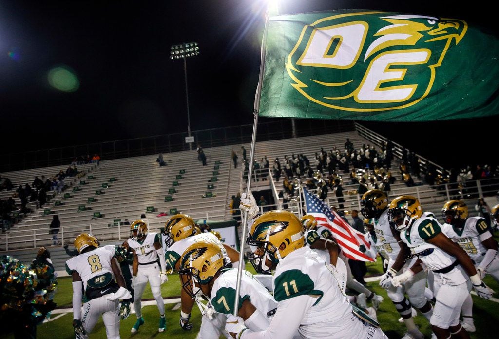 The DeSoto Eagles football team takes the field to face Skyline during their Class 6A...