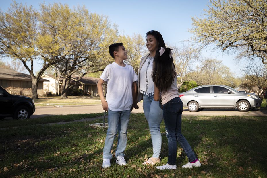 Aydin Franco, 9, with his family, mother Shani Leon and sister Layla Franco, 7, outside their home in Richardson, on March 26, 2021. Aydin is one of the students identified as gifted through Richardson ISD's new process. 