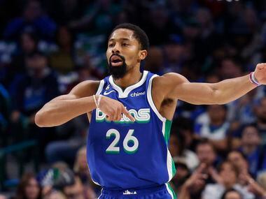 Dallas Mavericks guard Spencer Dinwiddie (26) celebrates a three-point shot during the first...