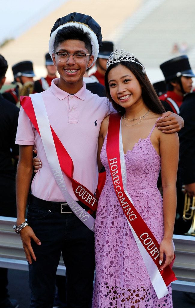 North Garland Homecoming King and Queen, Jose Carrillo and Tran Phan pose together before...