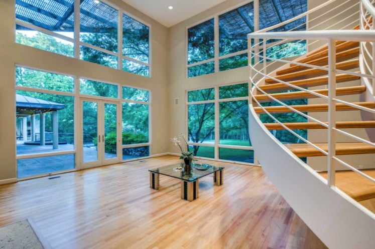 The North Dallas home has a floating staircase.