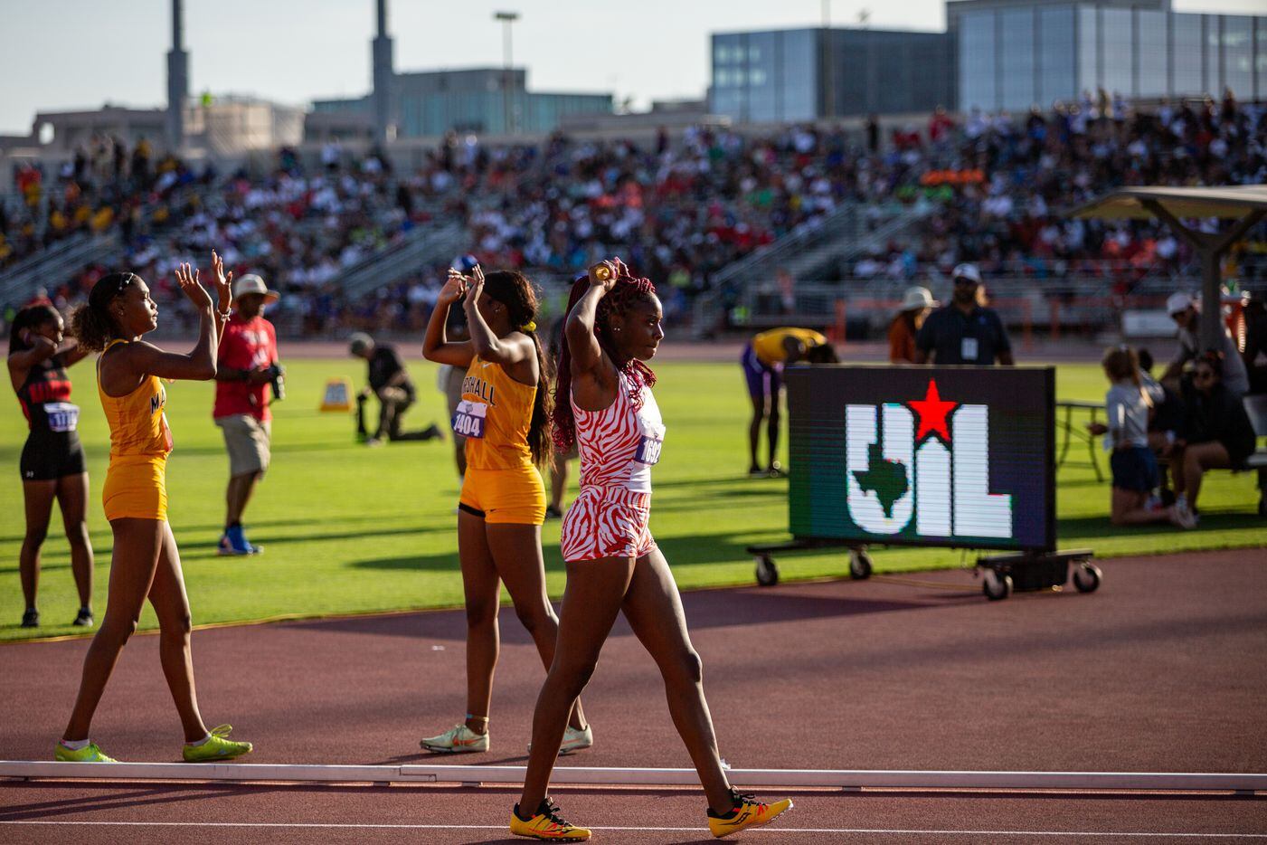 Lancaster’s Kelaiah Daniyan catches her breath after the girls’ 4x200 relay final at the UIL...