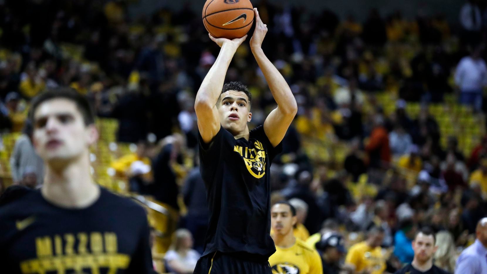 FILE - Missouri's Michael Porter Jr. warms up before the start of an NCAA college basketball...