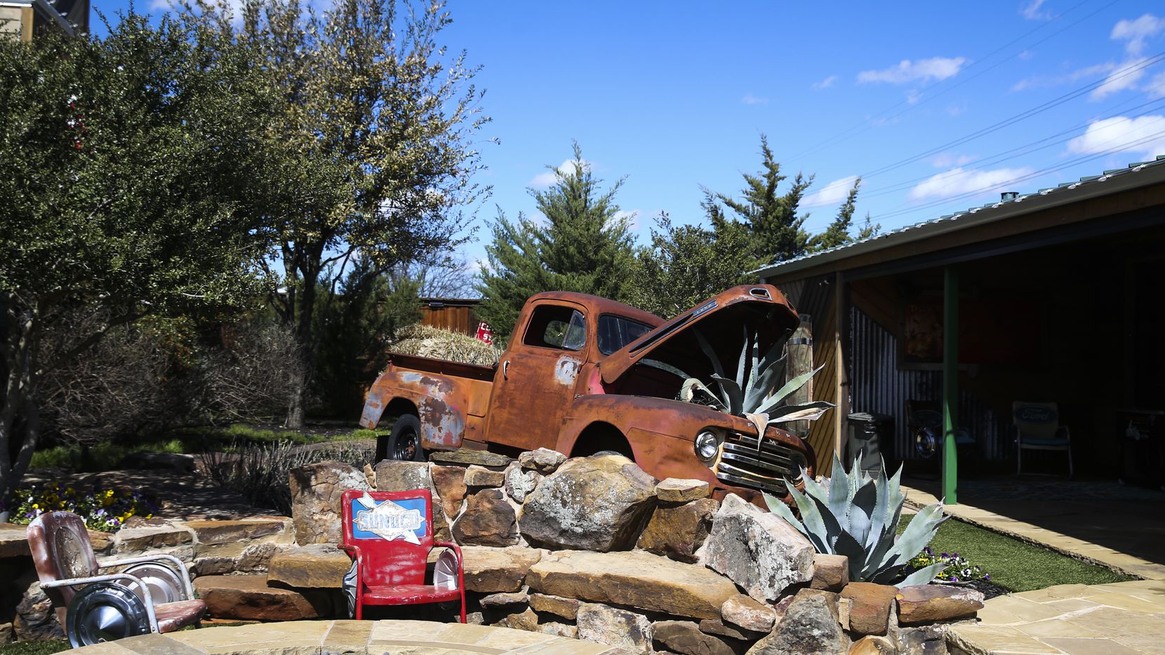 A rusted 1940's truck is seen used as a planter at the Solera TAC 1 innovation property on Wednesday, March 13, 2019. (Ryan Michalesko/The Dallas Morning News)